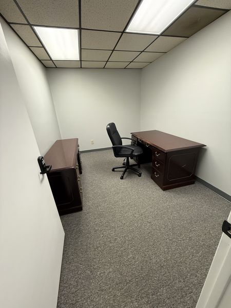 Furnished private office with desk and task chair